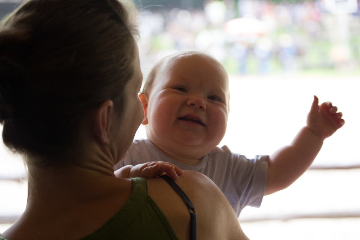Happy baby with mom
